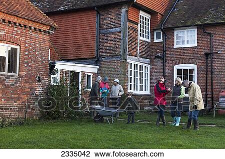 Stock Image - People At Farm Shop At Autumn; Surrey, England, Uk. Fotosearch