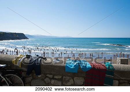 Stock Image - People At Itzurun Beach, Zumaia, Basque Country, Spain. Fotosearch