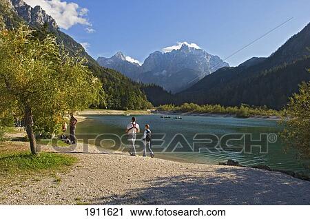 Stock Image - People At Lake Jasna, Kranjska Gora, Slovenia. Fotosearch