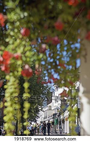 Stock Photo - People At Pantiles With Reflection In Window, Tunbridge Wells, Kent, England, Uk. Fotosearch