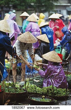 Stock Photo - People At Street Vegetable Market. Fotosearch