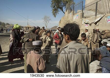People At The Pakistan Border Crossing In Torkham, Nangarhar Province, Afghanistan View Large Photo Image Stock Image - People At The Pakistan Border Crossing In Torkham, Nangarhar Province, Afghanistan. Fotosearch