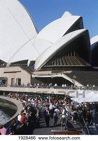 Stock Photograph - People Beneath The Sydney Opera House. Fotosearch