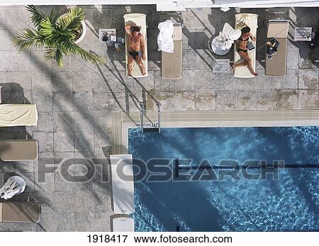 People Beside The Swimming Pool Of The Tides Hotel, Ocean Drive, South Beach, Miami View Large Photo Image Stock Photo - People Beside The Swimming Pool Of The Tides Hotel, Ocean Drive, South Beach, Miami. Fotosearch