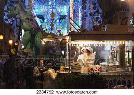 People Buying Churros During Fallas Festival; Valencia, Spain View Large Photo Image Stock Image - People Buying Churros During Fallas Festival; Valencia, Spain. Fotosearch