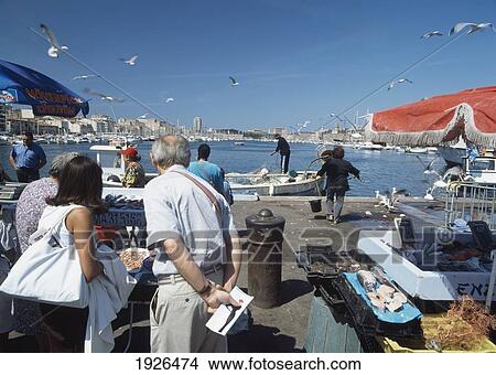 People Checking Out Fish Stalls View Large Photo Image Picture - People Checking Out Fish Stalls. Fotosearch