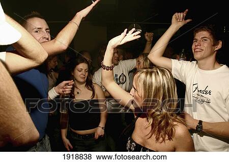 People Dancing In At Nightclub View Large Photo Image Stock Photo - People Dancing In At Nightclub. Fotosearch