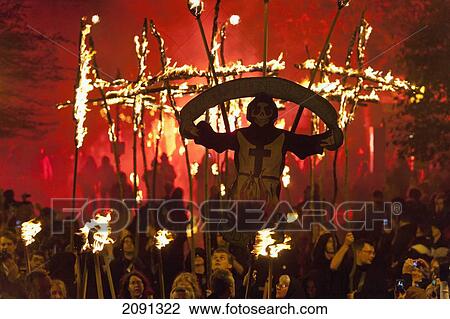 People Dressed As Monks Carrying Southover Bonfire Society Banner And Burning Crosses Lit From Behind By Red Flare On Bonfire Night, Lewes, East Sussex, Uk View Large Photo Image Stock Image - People Dressed As Monks Carrying Southover Bonfire Society Banner And Burning Crosses Lit From Behind By Red Flare On Bonfire Night, Lewes, East Sussex, Uk. Fotosearch