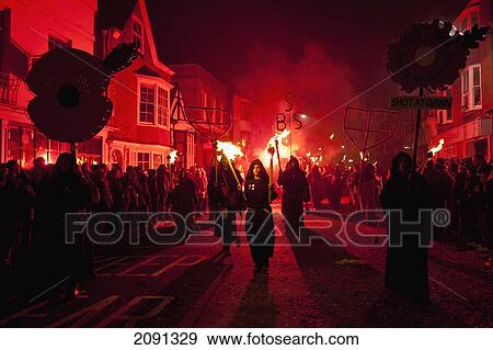 Stock Photo - People Dressed As Monks From Southover Bonfire Society Marching On The United Grand Procession In Lewes On Bonfire Night, East Sussex, Uk. Fotosearch