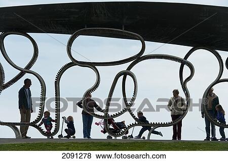 People Enjoying At 'the Longest Bench', Littlehampton, West Sussex, Uk View Large Photo Image Stock Photo - People Enjoying At 'the Longest Bench', Littlehampton, West Sussex, Uk. Fotosearch