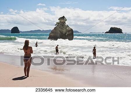 People Enjoying Holidays On Beach; New Zealand View Large Photo Image Stock Photography - People Enjoying Holidays On Beach; New Zealand. Fotosearch