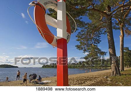 People Enjoying The Lakeside. View Large Photo Image Stock Photo - People Enjoying The Lakeside.. Fotosearch