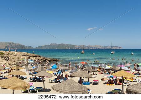 People Enjoying The Summer In Cala Sant Pere, Alcudia, Mallorca, Balearic Islands, Spain View Large Photo Image Stock Image - People Enjoying The Summer In Cala Sant Pere, Alcudia, Mallorca, Balearic Islands, Spain. Fotosearch