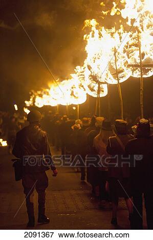 Stock Photo - People From East Hoathly & Halland Carnival Society Carrying Large Burning Banner Through East Hoathly On Bonfire Night, East Sussex, Uk. Fotosearch