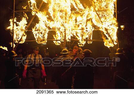 People From East Hoathly & Halland Carnival Society Carrying Large Burning Banner Through East Hoathly On Bonfire Night, East Sussex, Uk View Large Photo Image Stock Photography - People From East Hoathly & Halland Carnival Society Carrying Large Burning Banner Through East Hoathly On Bonfire Night, East Sussex, Uk. Fotosearch