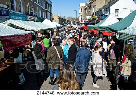 Stock Photo - People Hanging Around In Broadway Market In Shoreditch, East London, London, Uk. Fotosearch