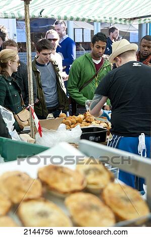 People Hanging Around In Broadway Market In Shoreditch, East London, London, Uk View Large Photo Image Stock Photograph - People Hanging Around In Broadway Market In Shoreditch, East London, London, Uk. Fotosearch
