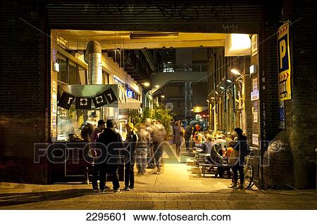 Stock Image - People Hanging Out In 1001 Bar In Brick Lane, East London, London, Uk. Fotosearch