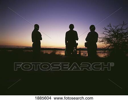 Picture - People Having Sundowners Beside The Shire River. Fotosearch