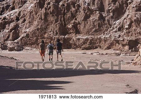 People Hiking In The Valle De La Luna (Moon Valley), San Pedro De Atacama, Antofagasta Region, Chile View Large Photo Image Stock Image - People Hiking In The Valle De La Luna (Moon Valley), San Pedro De Atacama, Antofagasta Region, Chile. Fotosearch