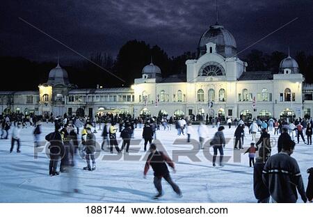 Picture - People Ice Skating At Night. Fotosearch