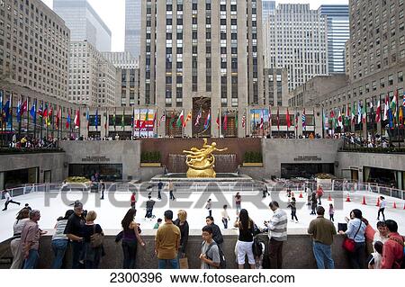People Ice Skating In The Rockefeller Center Ice Rink, Midtown Manhattan, New York, Usa View Large Photo Image Stock Photograph - People Ice Skating In The Rockefeller Center Ice Rink, Midtown Manhattan, New York, Usa. Fotosearch