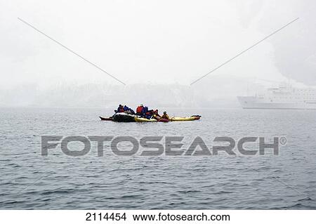 People In A Boat Off The Frozen Shore; Antarctica View Large Photo Image Picture - People In A Boat Off The Frozen Shore; Antarctica. Fotosearch