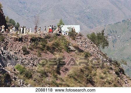 People In A Burial Procession After The 8 October 2005 Earthquake, Chikar, Azad Kashmir, Pakistan View Large Photo Image Stock Photo - People In A Burial Procession After The 8 October 2005 Earthquake, Chikar, Azad Kashmir, Pakistan. Fotosearch