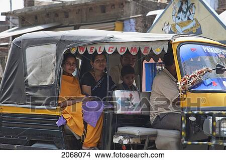 Picture - People In An Autorickshaw, Gaya, Bihar, India. Fotosearch