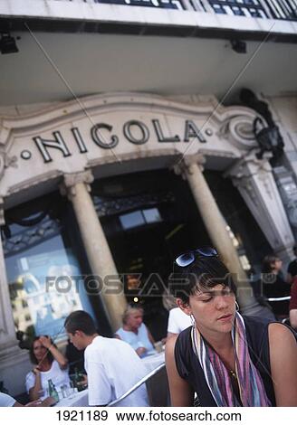 Stock Photo - People In Cafe; Lisbon, Portugal. Fotosearch