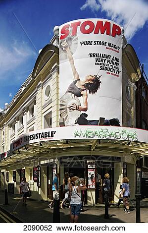Stock Image - People In Front Of Ambassadors Theater, London, Uk. Fotosearch