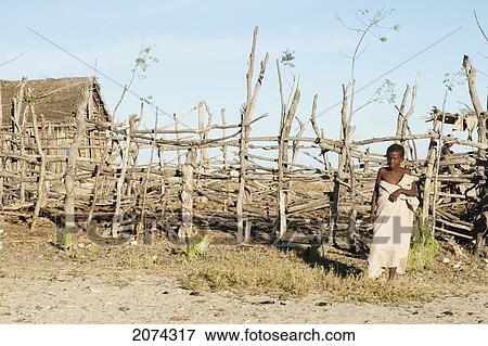 People In Front Of Their Homes In Mangily, Toliara Province, Madagascar View Large Photo Image Stock Photo - People In Front Of Their Homes In Mangily, Toliara Province, Madagascar. Fotosearch