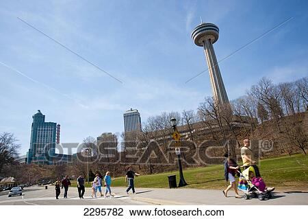 Stock Image - People In Niagara Falls City, Ontario And New York Border, Canada And United States Of America. Fotosearch