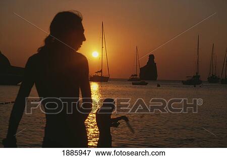 People In Silhouette At Benirras Beach View Large Photo Image Stock Photo - People In Silhouette At Benirras Beach. Fotosearch