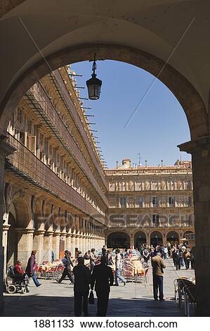 Stock Image - People In The Plaza Mayor, The Main Square; Salamanca, Salamanca Province, Spain. Fotosearch