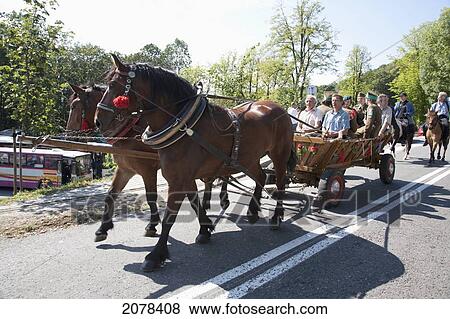 People In Their Horse Carts After The Blessing Of The Horses At The Kalwaria Zebrzydowska Sanctuary, Malopolska, Poland View Large Photo Image Stock Photo - People In Their Horse Carts After The Blessing Of The Horses At The Kalwaria Zebrzydowska Sanctuary, Malopolska, Poland. Fotosearch