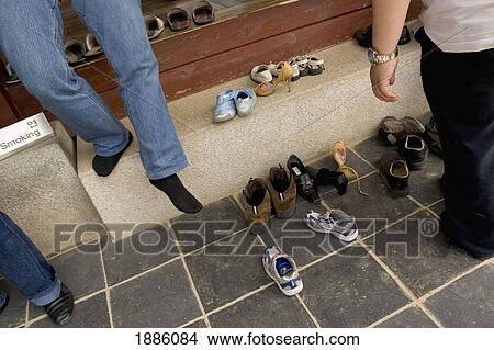 Picture - People Leaving Shoes Outside Guyeongbokgung Palace. Fotosearch