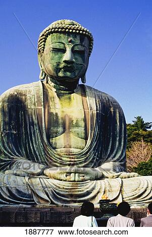Stock Photo - People Looking At Great Buddha Statue, Rear View. Fotosearch