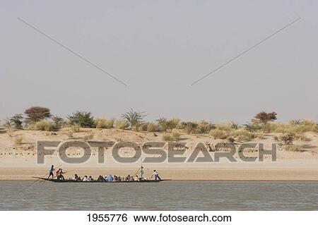 Stock Photograph - People On A Boat On The Niger River Between Niafunke And Kabara, Mali. Fotosearch