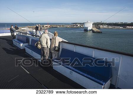 Stock Photo - People on board of ferry boat; County Wexford, Ireland, UK. Fotosearch