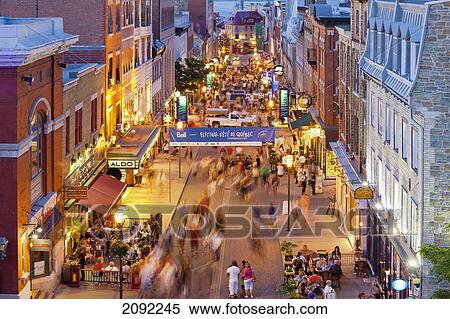 People On Saint-Jean Street At Dusk During Festival D'ete De Quebec; Quebec City Quebec Canada View Large Photo Image Stock Photography - People On Saint-Jean Street At Dusk During Festival D'ete De Quebec; Quebec City Quebec Canada. Fotosearch