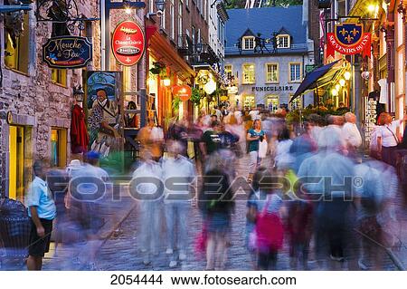 Picture - People On Sous Le Fort Street At Dusk, Quartier Petit Champlain, Quebec City, Quebec.. Fotosearch