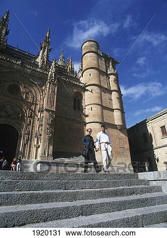 Stock Image - People On Steps Ofnew Cathedral. Fotosearch