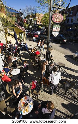 People On Terrace, Saint-Denis Street, Quartier Latin, Montreal, Quebec. View Large Photo Image Stock Photograph - People On Terrace, Saint-Denis Street, Quartier Latin, Montreal, Quebec.. Fotosearch