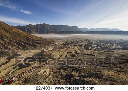 People on the staircase to the rim of the crater of Mount Bromo, Bromo Tengger Semeru National Park, East Java, Indonesia View Large Photo Image Stock Photo - People on the staircase to the rim of the crater of Mount Bromo, Bromo Tengger Semeru National Park, East Java, Indonesia. Fotosearch