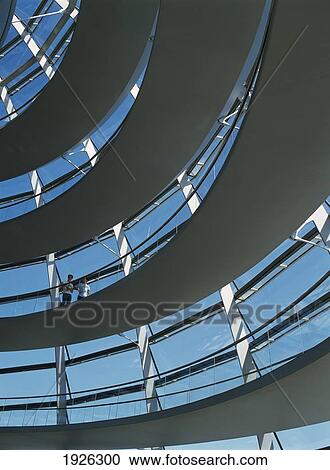 Stock Image - People On Walkway Inside Reichstag Dome. Fotosearch