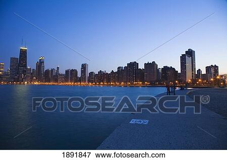 People Photographing City Skyline At Dusk View Large Photo Image Stock Photo - People Photographing City Skyline At Dusk. Fotosearch
