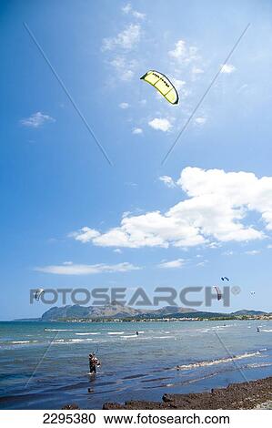 People Practicing Kyte Surf In S'albufereta Near Alcudia, Mallorca, Balearic Islands, Spain View Large Photo Image Stock Image - People Practicing Kyte Surf In S'albufereta Near Alcudia, Mallorca, Balearic Islands, Spain. Fotosearch