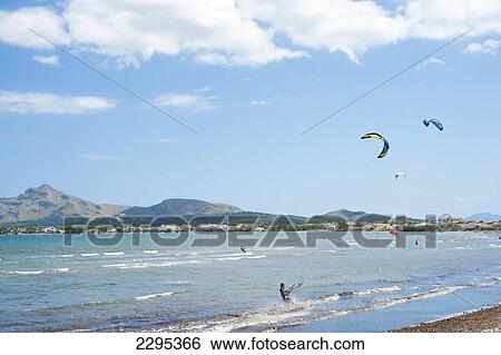 Stock Photograph - People Practicing Kyte Surf In S'albufereta Near Alcudia, Mallorca, Balearic Islands, Spain. Fotosearch