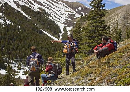 People Resting On Side Of Slope, Alberta, Canada View Large Photo Image Stock Photo - People Resting On Side Of Slope, Alberta, Canada. Fotosearch
